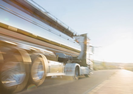 semi driving on a road