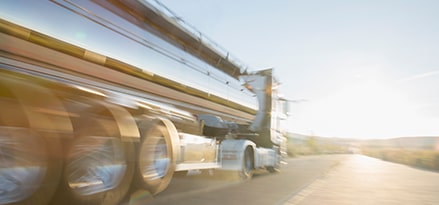 semi driving on a road